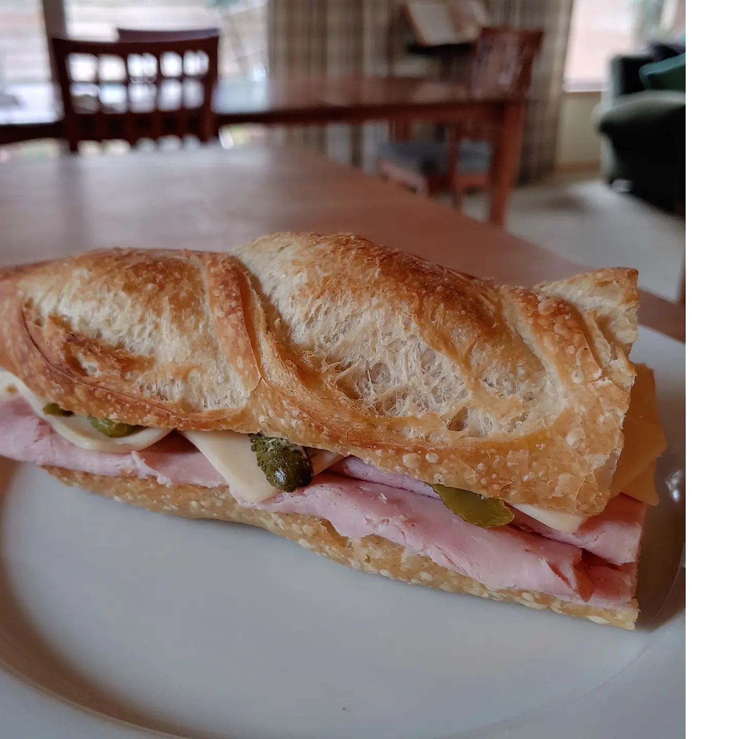 There are a lot of great sandwiches out there. Jambon-beurre ranks high on my list of favorites. Both for its simplicity, showcasing a handful of ingredients--just baguette, butter and ham in its purest form. (Top-quality versions of each, bien sûr.) And for the nostalgia it holds for me as the first thing I remember eating on French soil my first trip nearly 40 years ago. Commonly Dijon mustard, cornichons and fromage added too. As is true of this beauty from @bakerynouveau that was my lunch treat today. #sandwiches #butter #lunchtime #dejeuner #alafrancaise #jambonbeurre